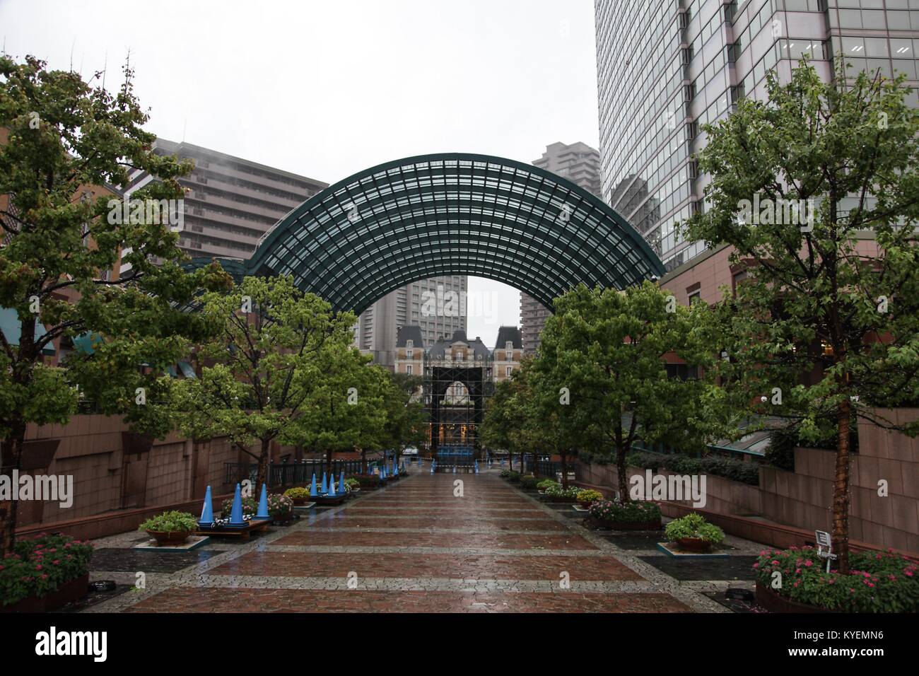Arch and walkway near Ebisu Station in Yebisu Garden Place, a popular shopping area, on a rainy day in Shibuya ward, Tokyo, Japan, October 16, 2017. () Stock Photo