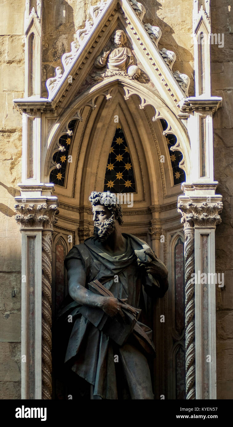 FLORENCE-FEBRUARY 16: the statue of saint Luke(replica) by Giambologna in the exterior of the Orsanmichele church,Florence,Italy,on February 16,2012. Stock Photo