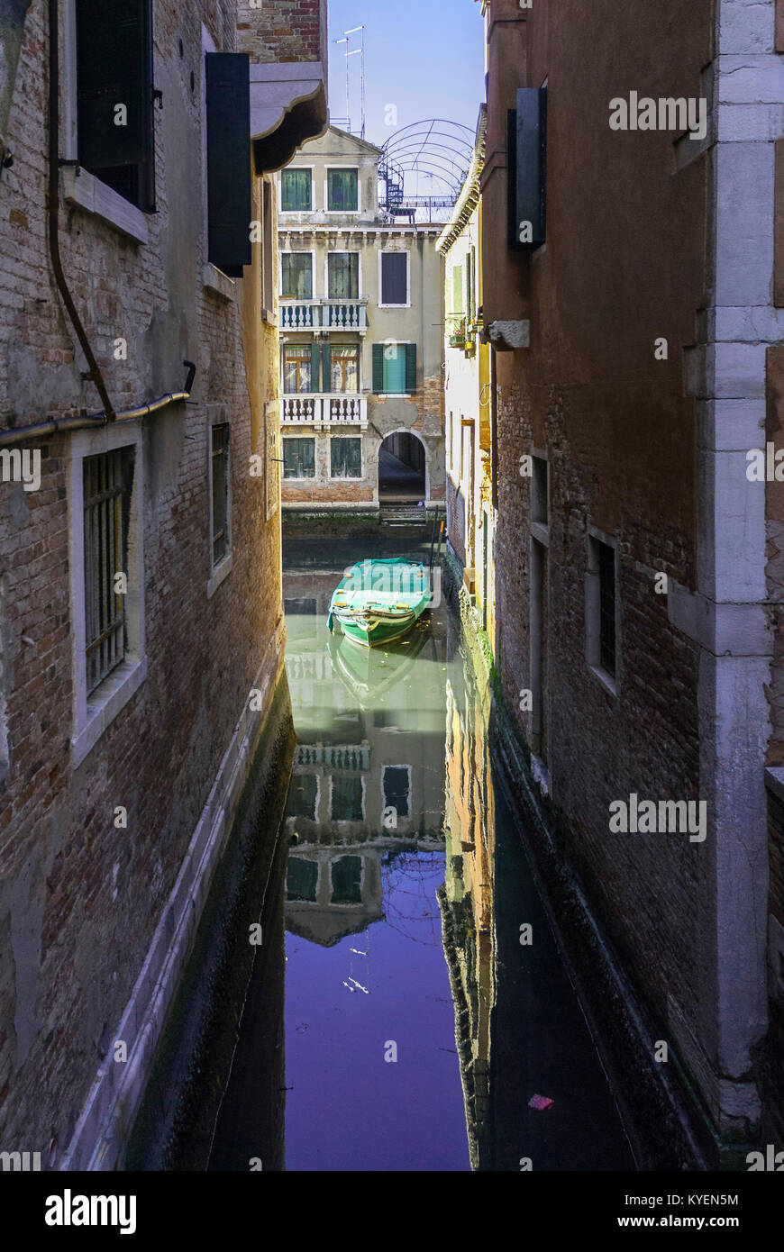 VENICE-MARCH 9: venetian canal with boat and classic buildings,Venice,Italy,on March 9,2017. Stock Photo
