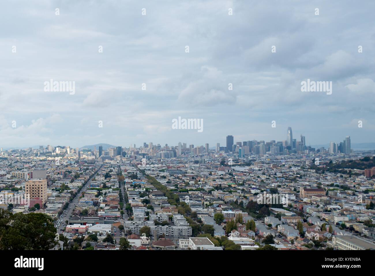 Aerial view of the urban skyline of San Francisco, California, as well as the Mission District, Potrero Hill, South of Market, and Dolores Heights neighborhoods under a dramatic sky, November 3, 2017. () Stock Photo