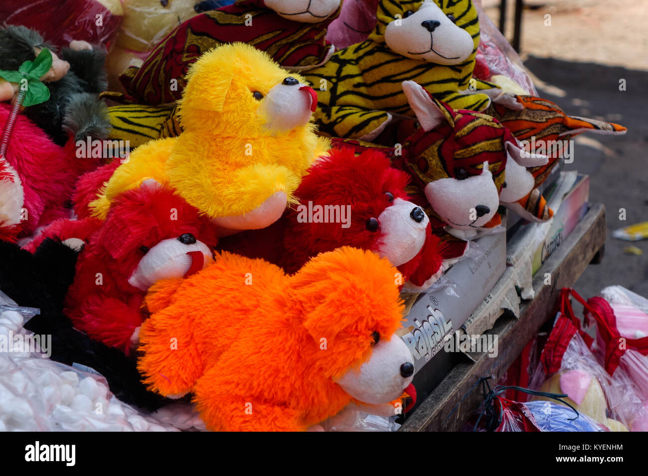 Stuffed fabric colorful toy dogs in local market Stock Photo