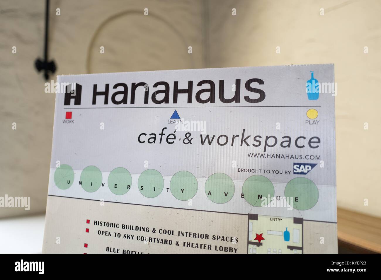 Close-up of sign for HanaHouse co-working space, created by German company SAP, at the Blue Bottle Coffee shop in Silicon Valley, Palo Alto, California, part of an adaptive reuse which turned the former Varsity Theater into an upscale cafe and HanaHouse co-working space, November 14, 2017. () Stock Photo