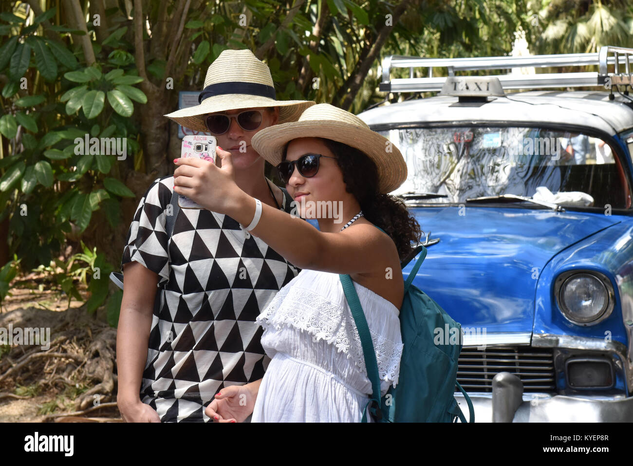 Tourists taking selfies Havana Stock Photo