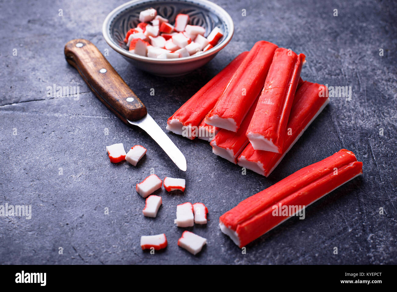 Crab sticks surimi and knife Stock Photo