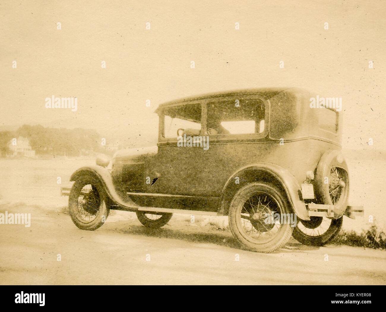 Automobile on the side of a road at Lake George during a road trip through New England, 1925. () Stock Photo