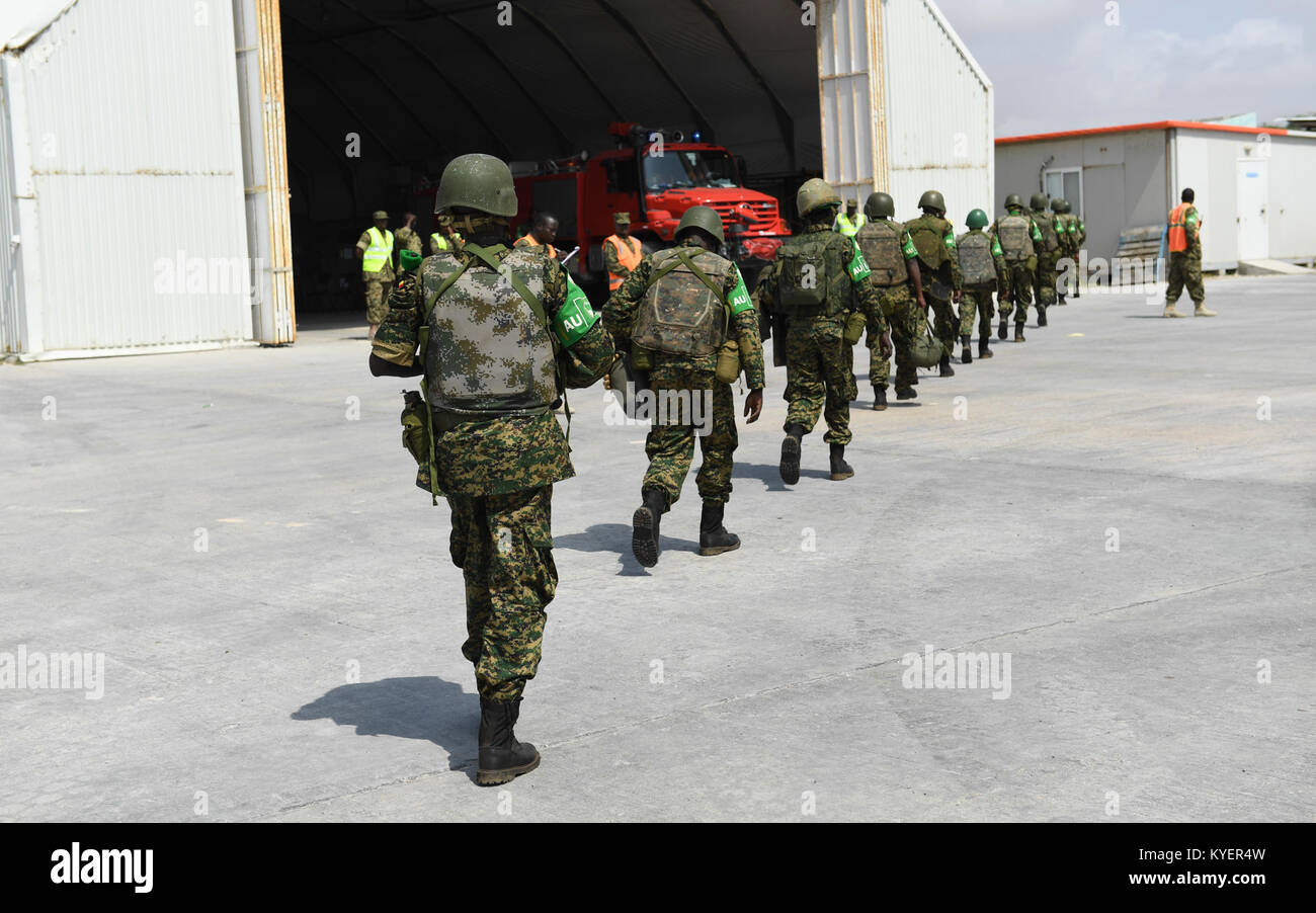 Newly deployed troops who will serve under the African Union Mission in Somalia walk at Aden Abdulle International Airport in Mogadishu, Somalia, on July 21, 2017. AMISOM Photo Stock Photo