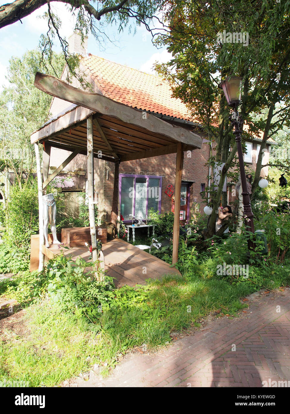 This photograph captures a scene from Ruigoord, a unique area in the Netherlands known for its artistic community and vibrant culture, often depicted in historical and contemporary imagery. Stock Photo