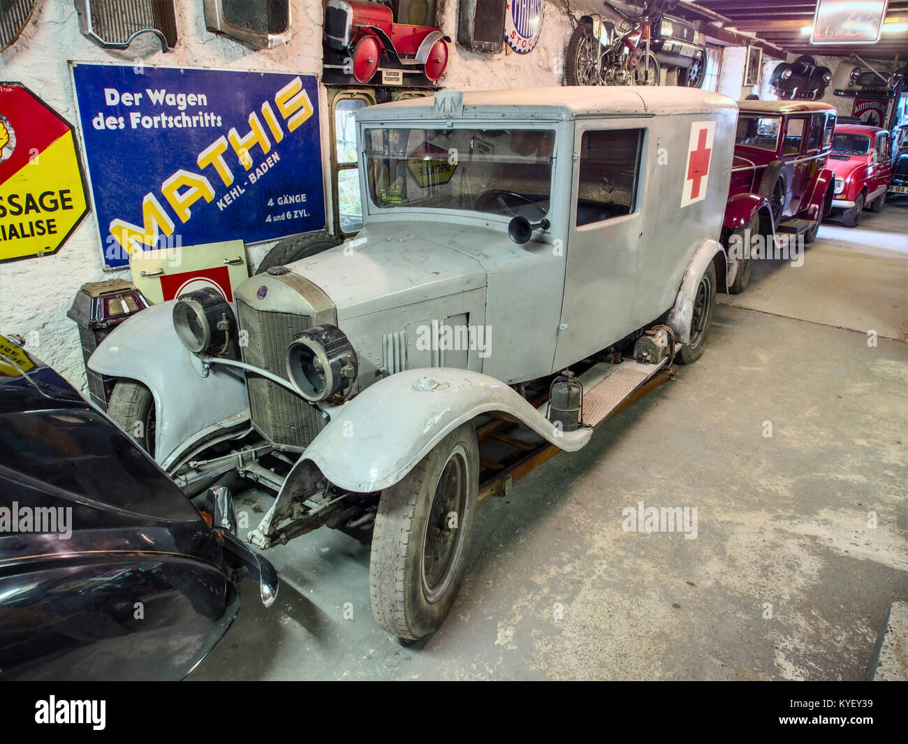 Photograph of a historic UNIC Krankenwagen, a vintage ambulance, on display at the Fahrzeugmuseum Marxzell, showcasing its design and historical context in emergency vehicle history. Stock Photo