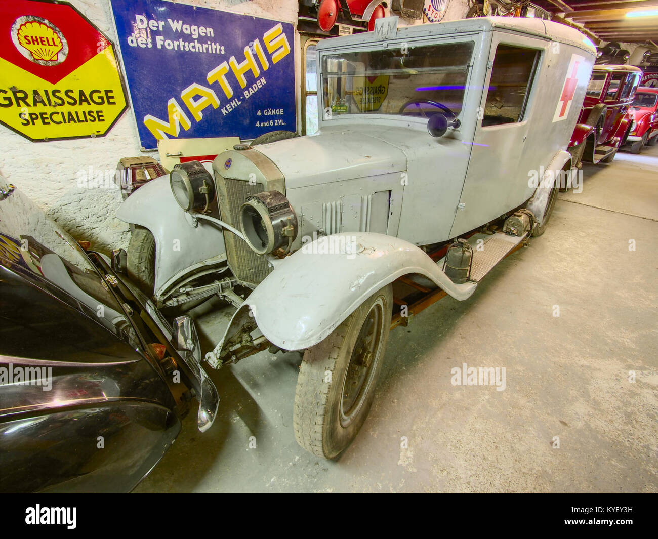 A photograph of a UNIC ambulance displayed at the Fahrzeugmuseum Marxzell, showcasing a vintage emergency vehicle. Stock Photo