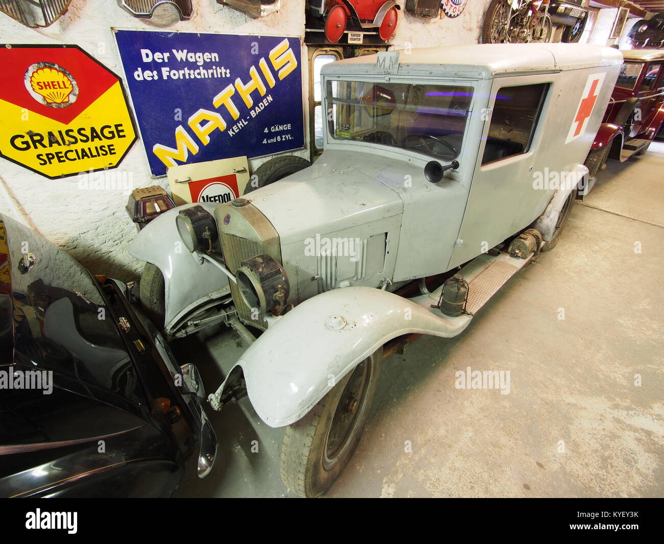 Photograph of a UNIC ambulance displayed at the Fahrzeugmuseum Marxzell, showcasing the vintage vehicle in a museum setting. Stock Photo