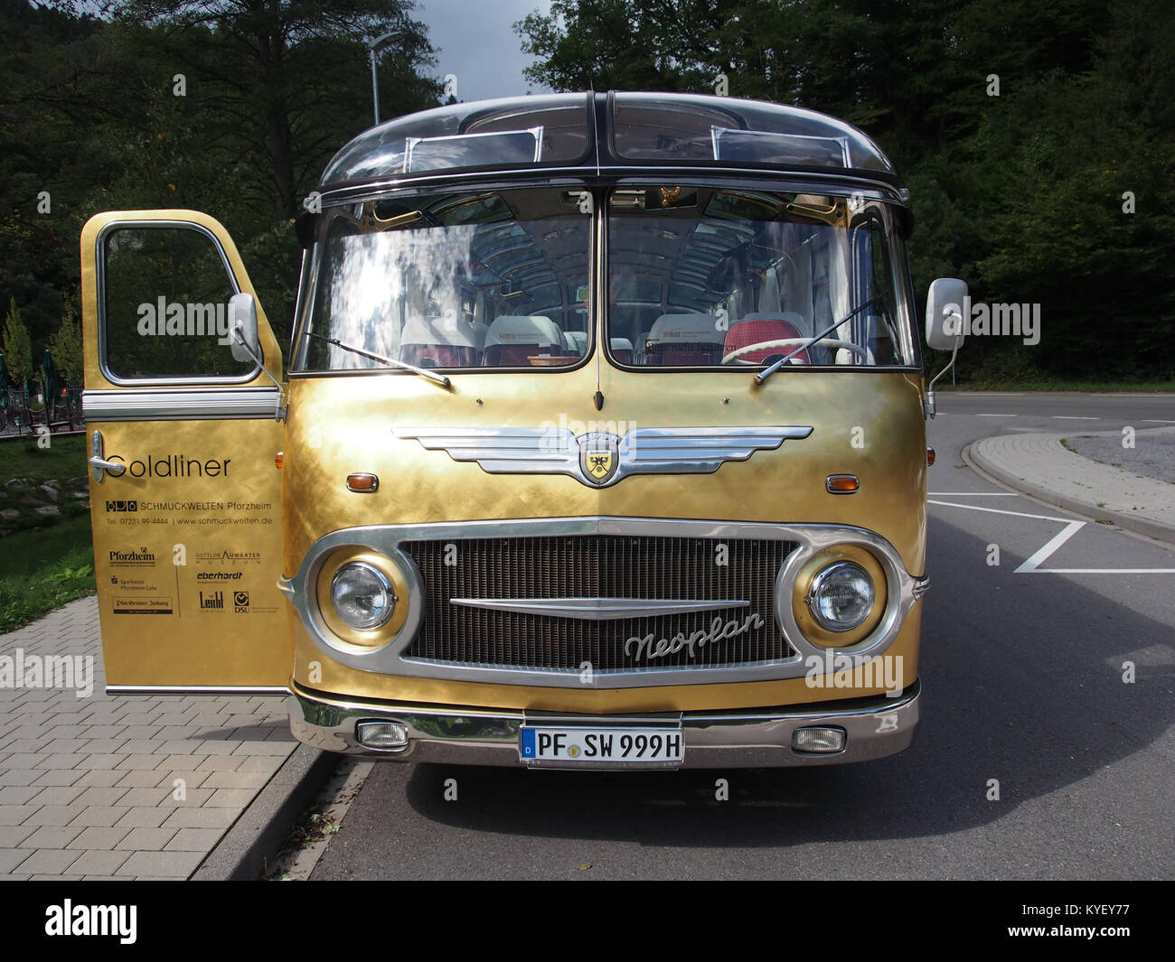 A photograph of a Neoplan bus, taken in Pforzheim, Germany. The image likely showcases the design or architecture of the bus, highlighting its features and location. Stock Photo