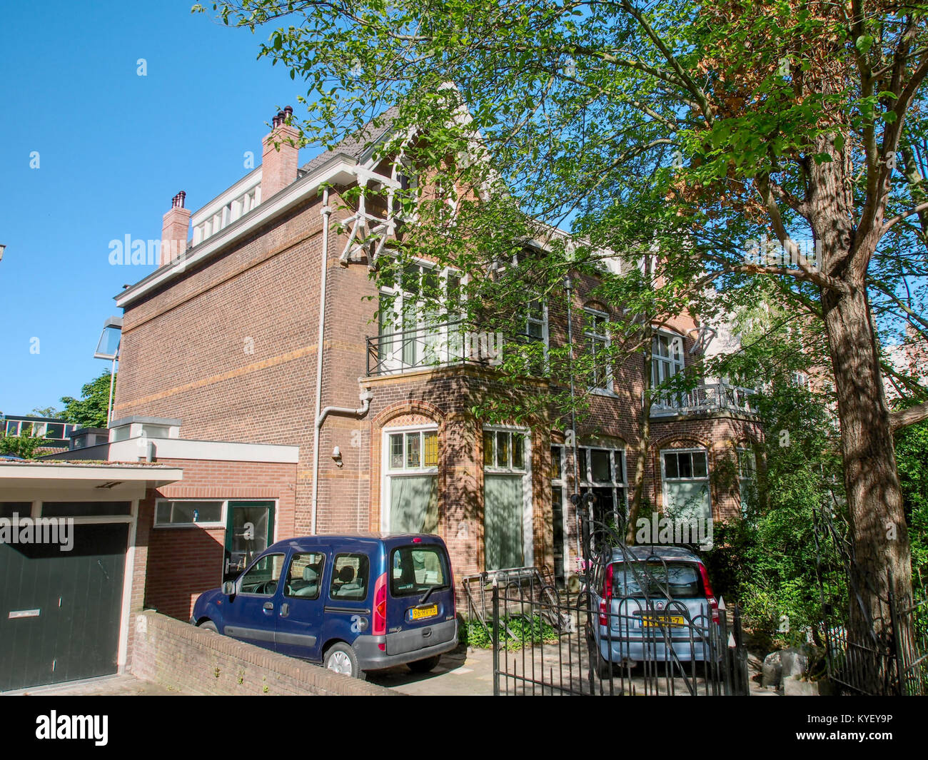 A photograph of the buildings at Middenweg 102-104, capturing the ...
