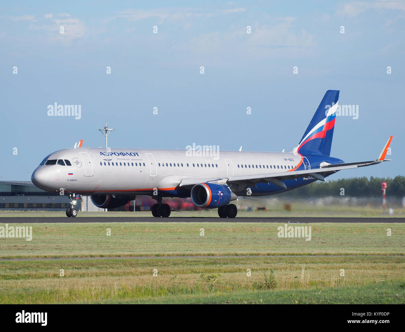 A photograph of an Aeroflot Airbus A321-211, registration number VP-BAZ, taking off from Schiphol Airport (AMS - EHAM) in the Netherlands. The image captures the aircraft during its departure, showcasing its design and operation. Stock Photo