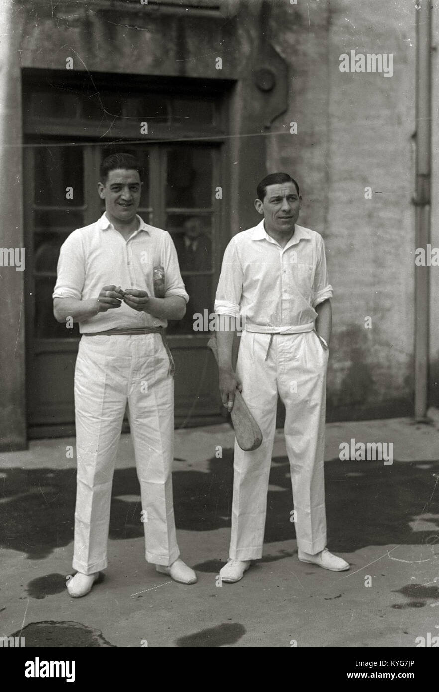 This photograph shows players on a fronton court before a game ...