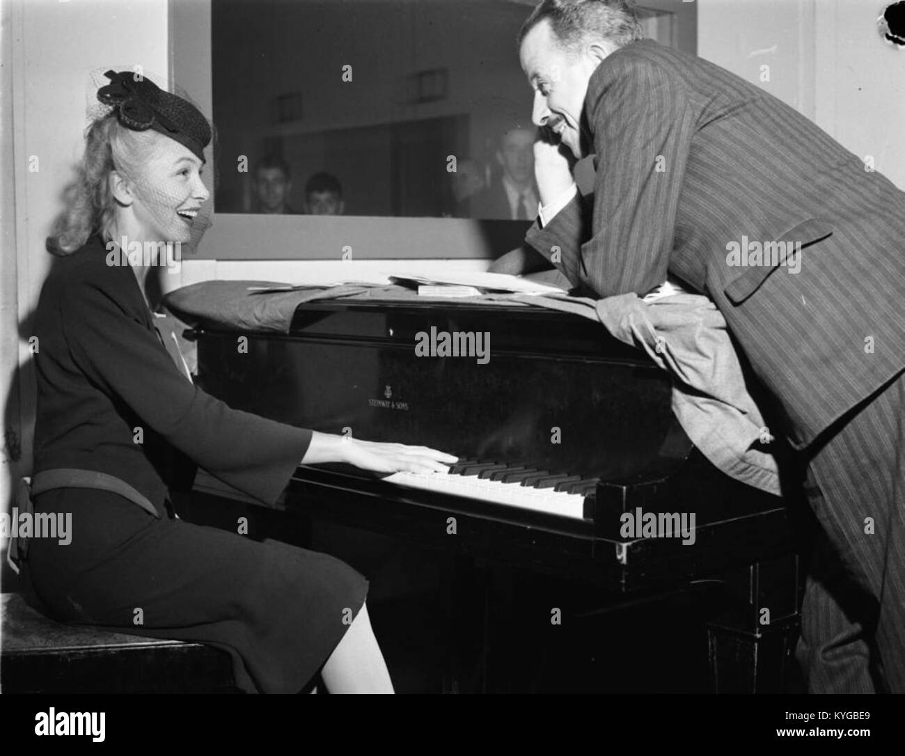 This historical radio program features Dr. Morhanges and Mimi D'Esté, a notable French radio show from the early 20th century. The program reflects the cultural and entertainment trends of the time, with personalities such as George Alexander contributing to its success. Stock Photo