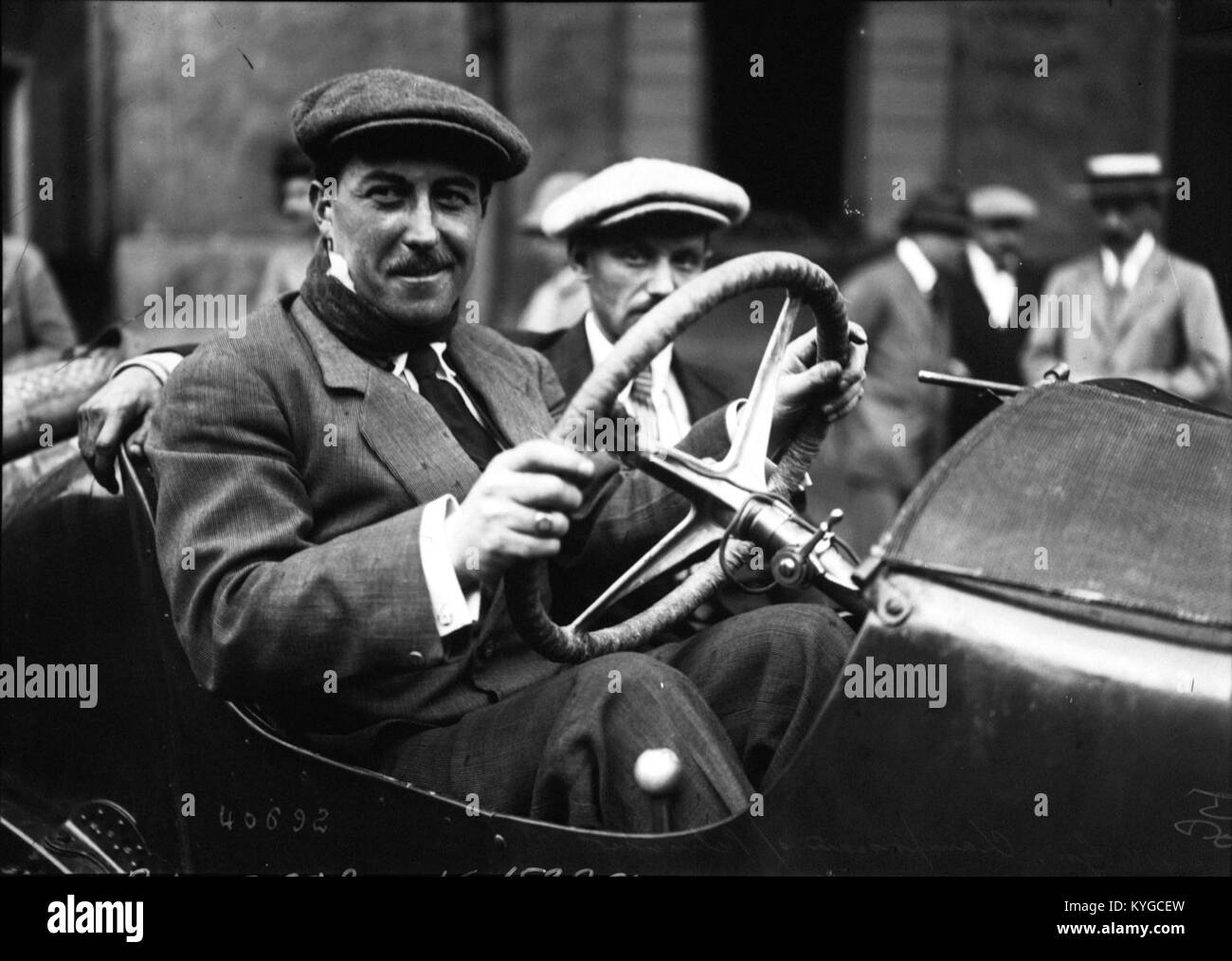This photograph captures René Champoiseau during the 1914 French Grand Prix, highlighting his participation in one of the earliest editions of the prestigious automobile race. Stock Photo