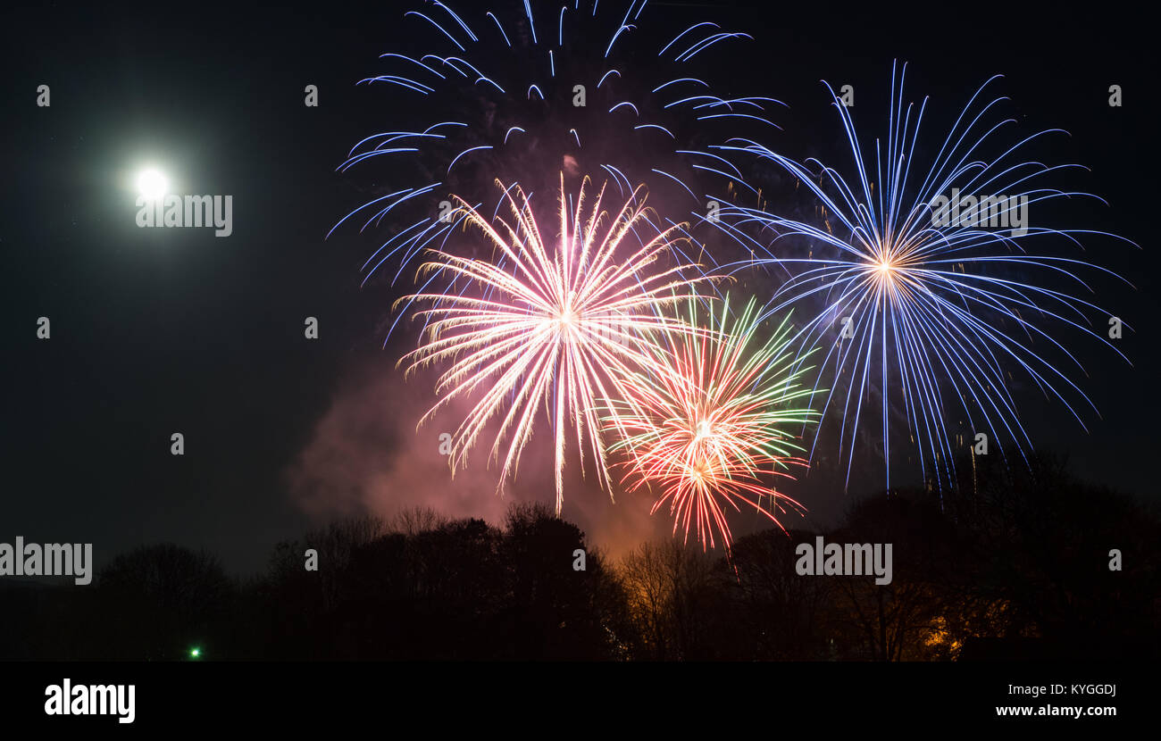 Fireworks over the Wensleydale market town of Hawes in the Yorkshire Dales National Park on bonfire Night. Stock Photo