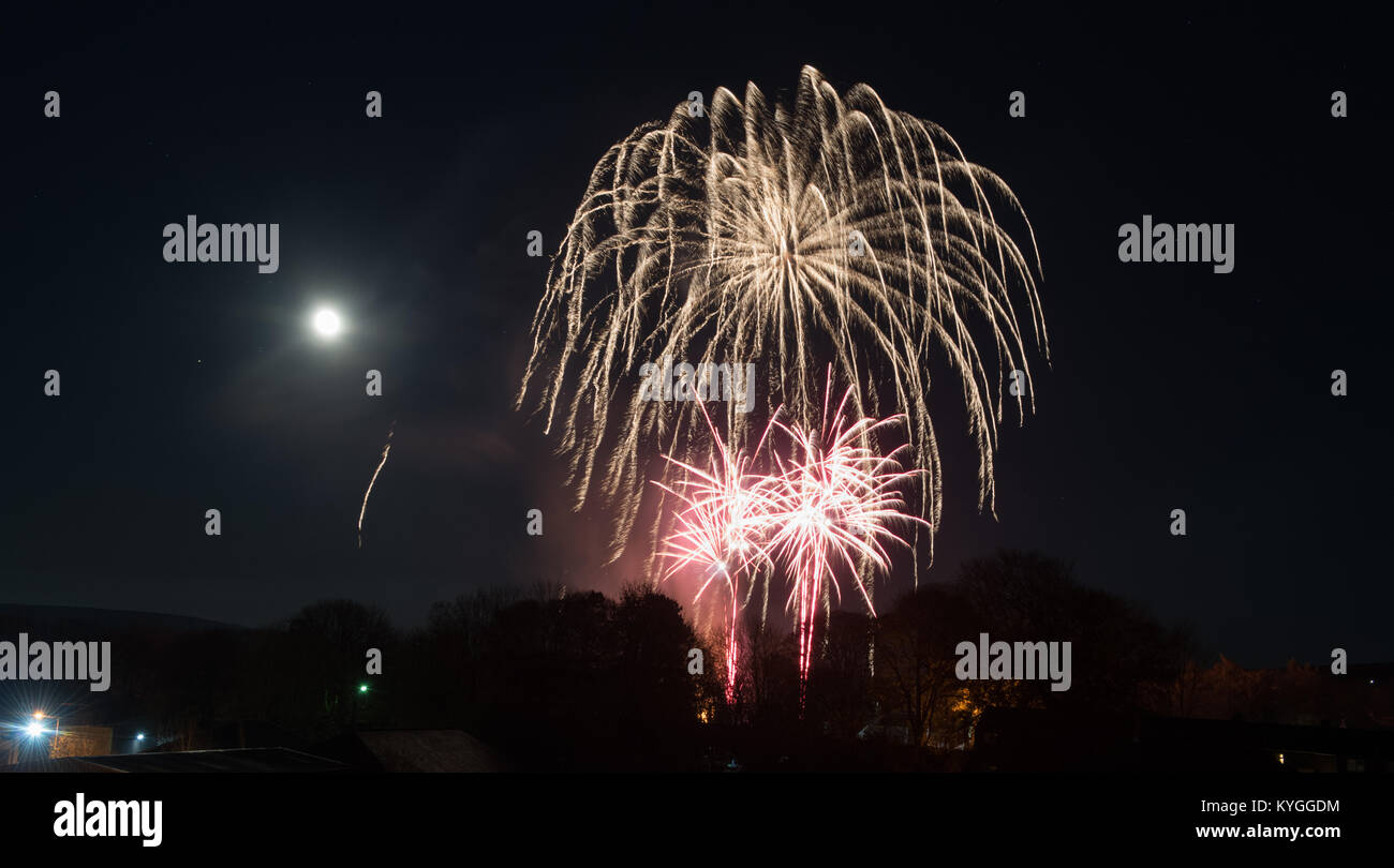 Fireworks over the Wensleydale market town of Hawes in the Yorkshire Dales National Park on bonfire Night. Stock Photo