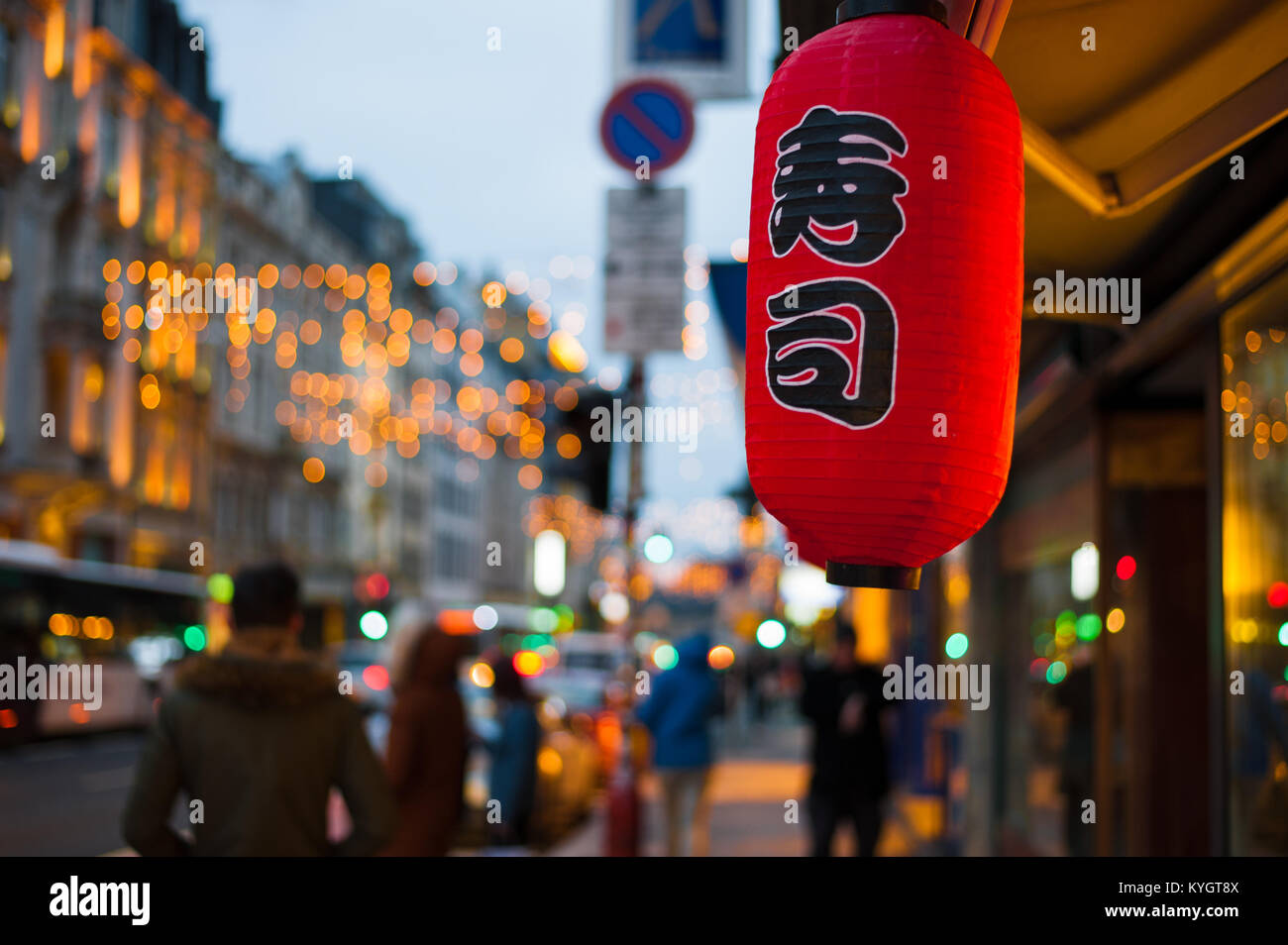 Red japanese lantern outside a restaurant in Luxembourg ville with bokeh lights Stock Photo