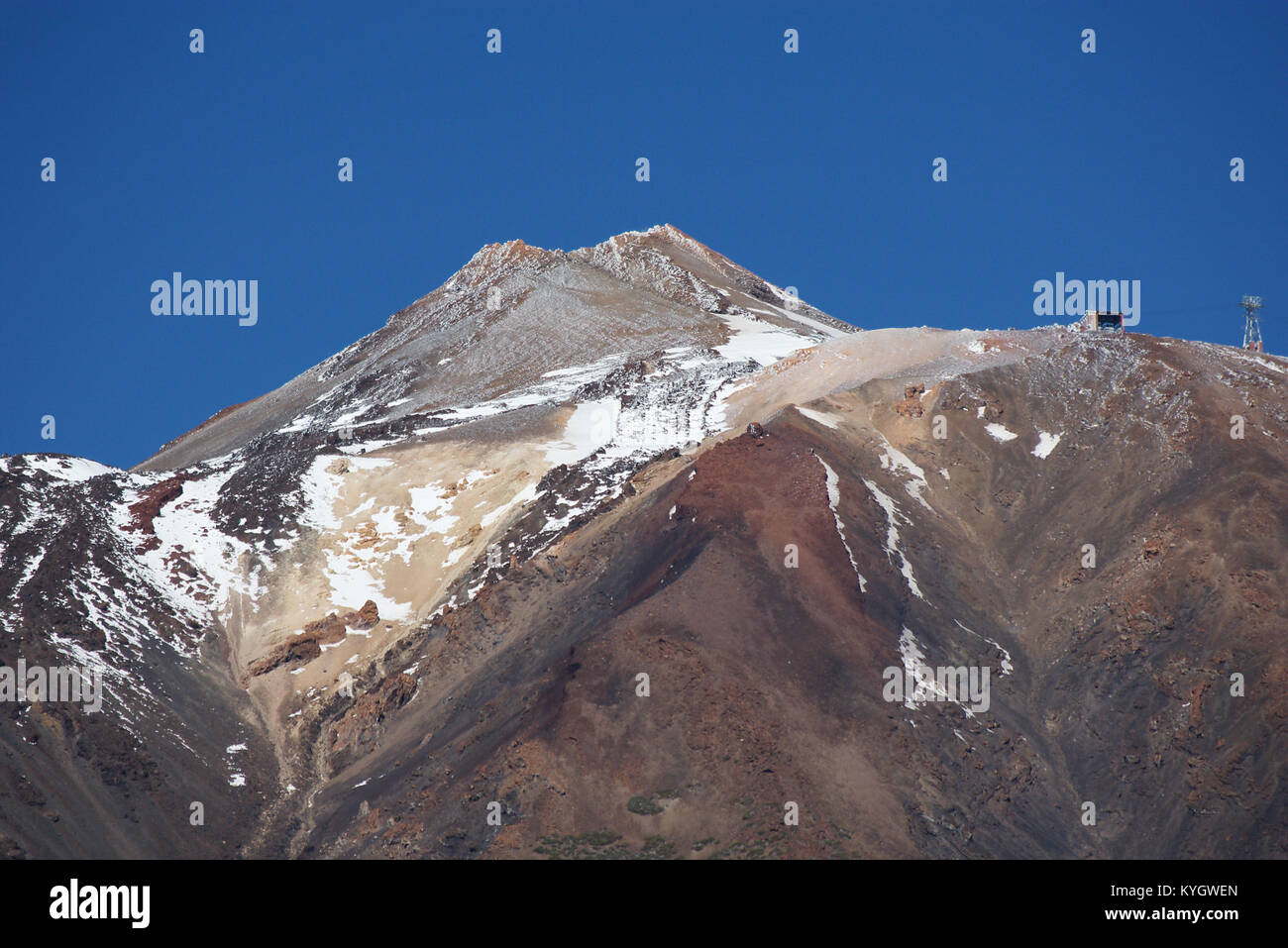 The snowy peak of the volcano Pico del Teide Stock Photo