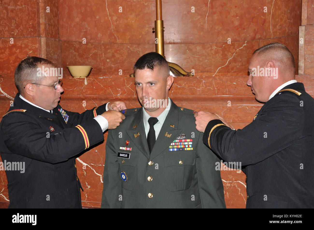 Kentucky Guardsman Howard Barcus stands at attention while being pinned ...