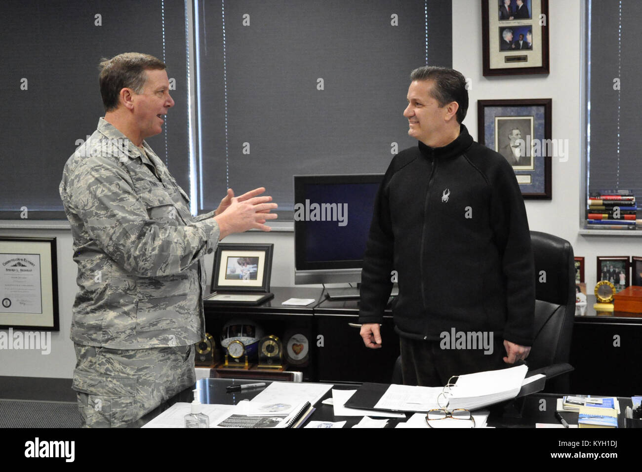 Governor Steve Beshear joined Kentucky's Adjutant General Maj. Gen. Edward W. Tonini and University of Kentucky Men's Basketball Coach John Calipari to speak with members of the 1204th Aviation Support Battalion currently deployed to Kuwait. Stock Photo
