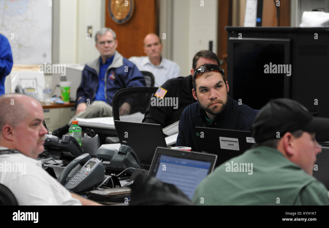 Members of the Kentucky Emergency Management synchronize information partaining to rescue and