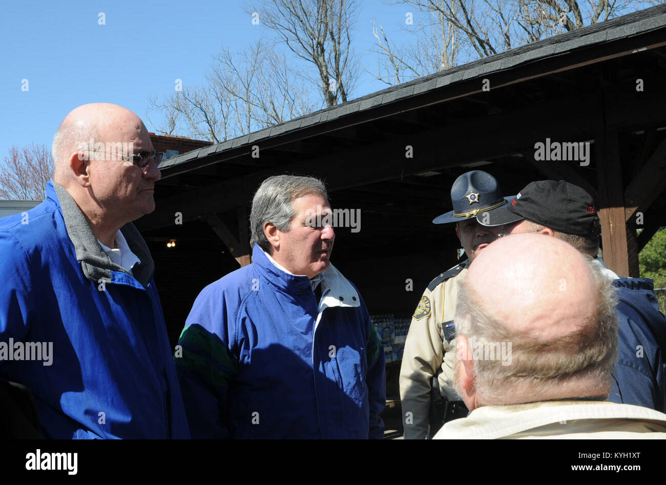 Kentucky's Lt. Gov. Jerry Abramson and State Sen. Tom Jensen talk with locals in East Bernstadt, Ky. about the clean-up on Mar. 3. (Photo by Spc. Brandy Mort, 133rd Mobile Public Affairs Detachment, Kentucky National Guard) Stock Photo