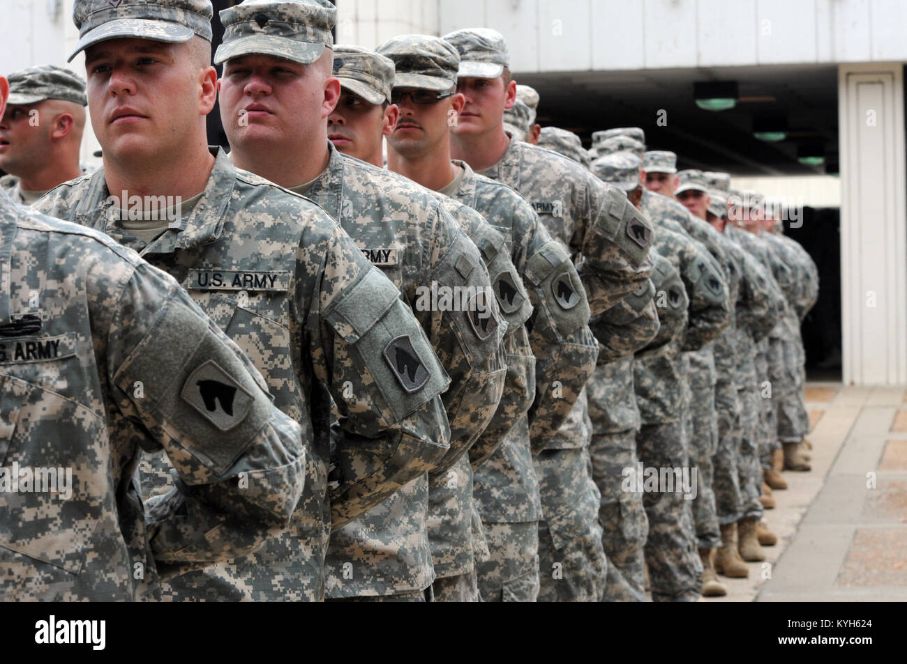 Soldiers From The 2nd Battalion, 138th Field Artillery Stand At Ease ...