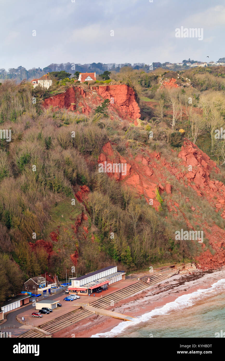 Red Permian breccia rockfall on the cliffs at Oddicombe beach,Babbacombe,Torquay, Devon. Stock Photo