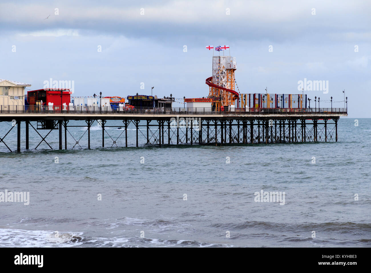 Amusements and arcades cover the length of the Victorian pier at Paignton, South Devon, UK Stock Photo