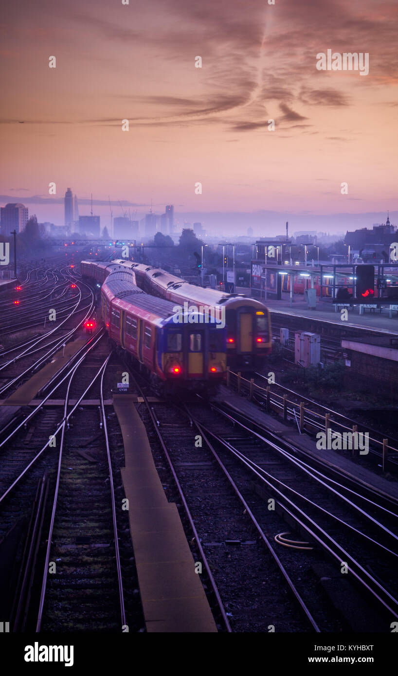 Trains at Clapham Junction, one of the world's busiest railway stations, heading into London for the morning commute. Stock Photo