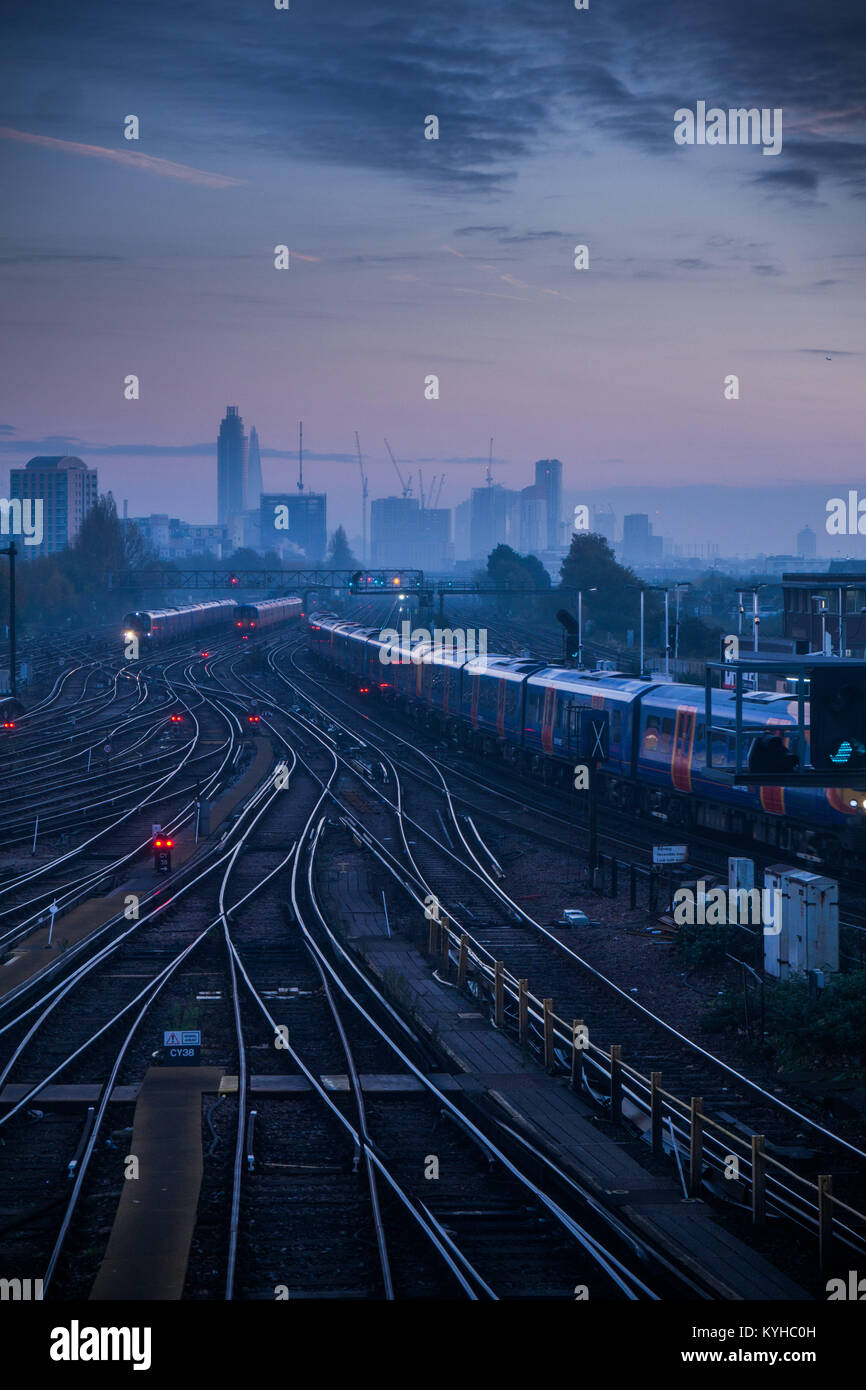 Trains at Clapham Junction, one of the world's busiest railway stations, heading into London for the morning commute. Stock Photo