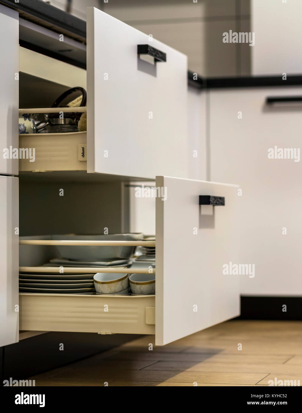 Open Kitchen Drawers With Plates And Cups Dishes Stock Photo