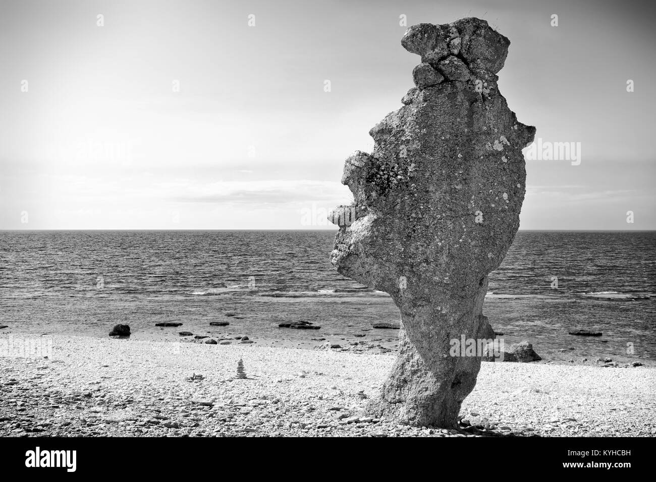 Swedish Faro Island huge rock formation called a rack on the Baltic Sea. Black and white monochrome. Stock Photo