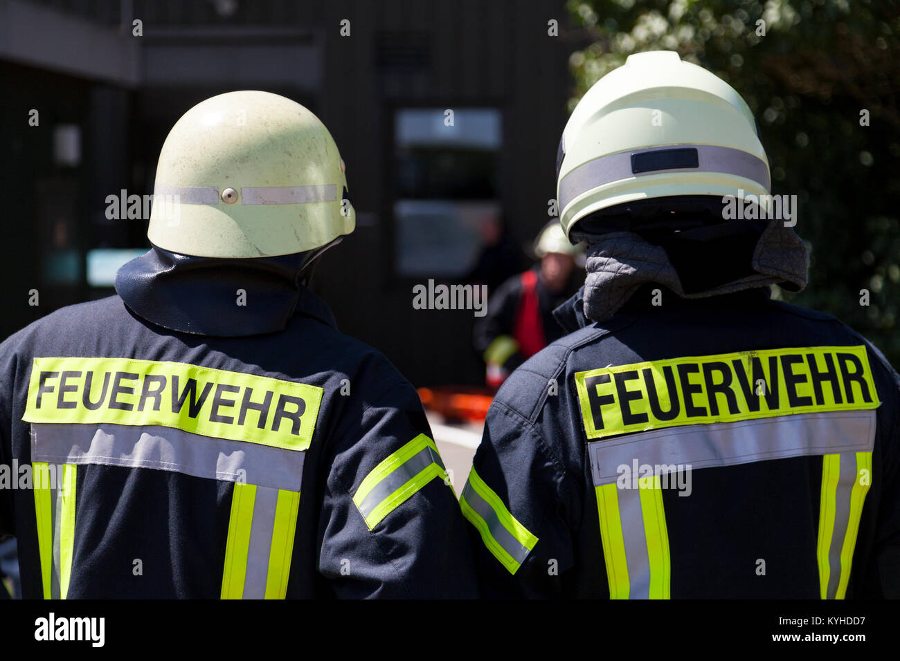 german fireman ( Feuerwehr ) stands near an accident Stock Photo