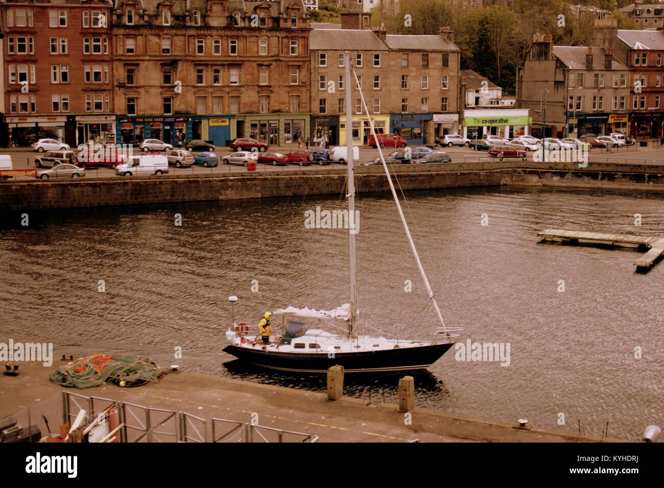 Rothesay harbour  yacht dinghy  bay,isle of Bute view from the sea ferry of the island United Kingdom Stock Photo