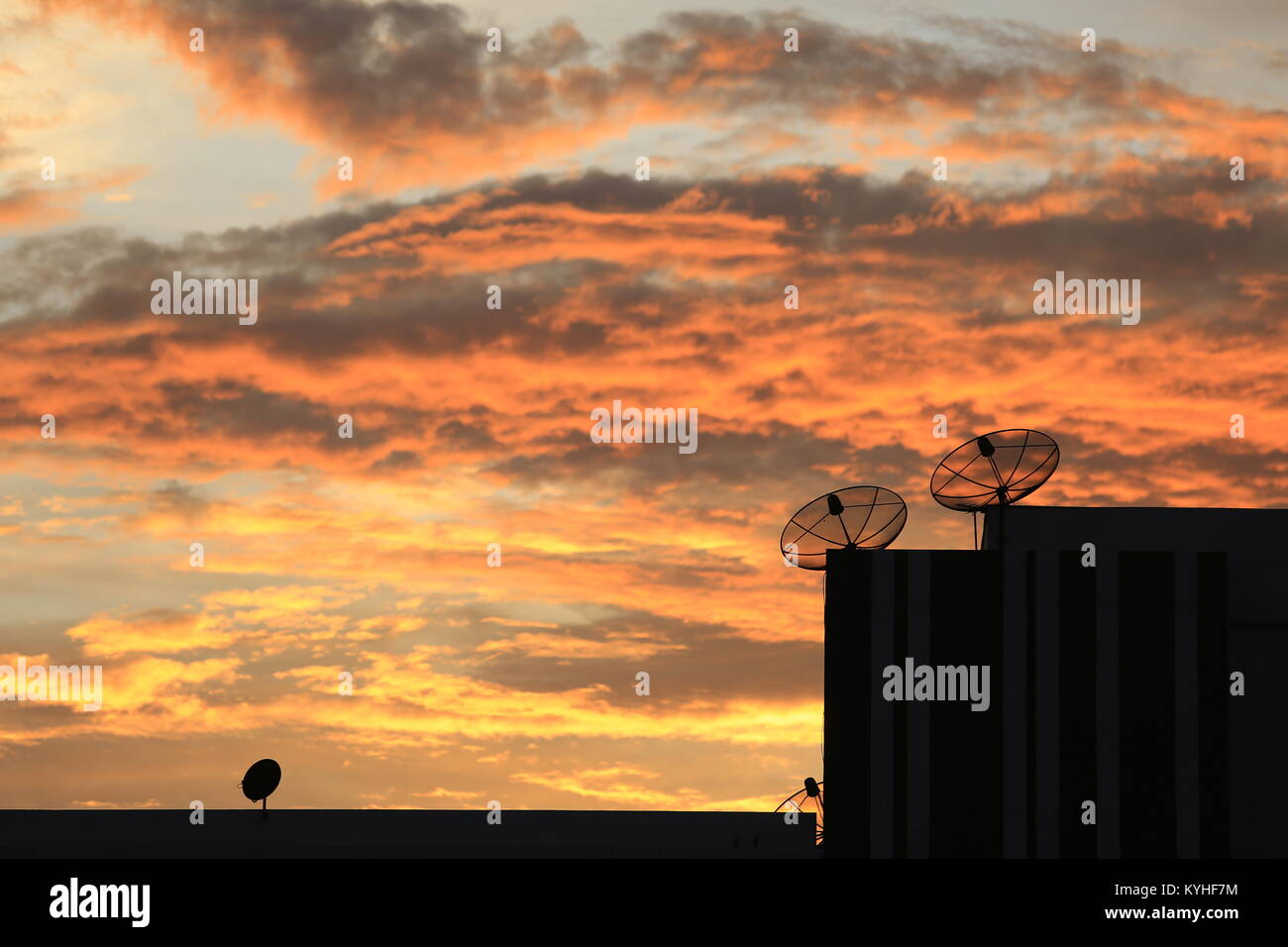 Satellite dish with evening sky. Stock Photo