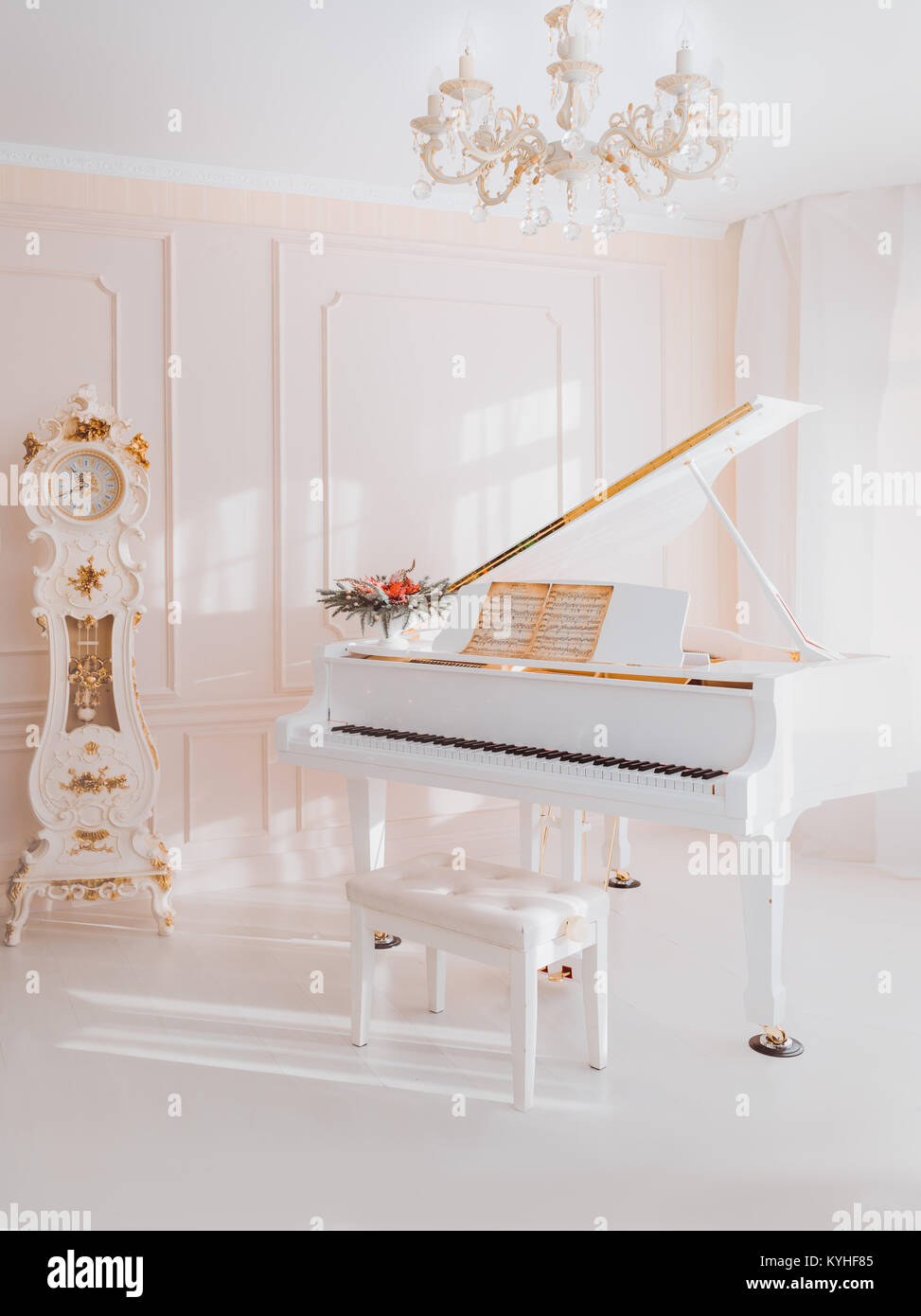 white grand piano standing in elegant interior Stock Photo
