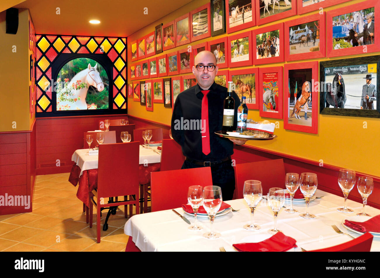 Fernando Lima posing in his traditional restaurant  Taverna Vaca das Cordas in Ponte de Lima, Portugal Stock Photo