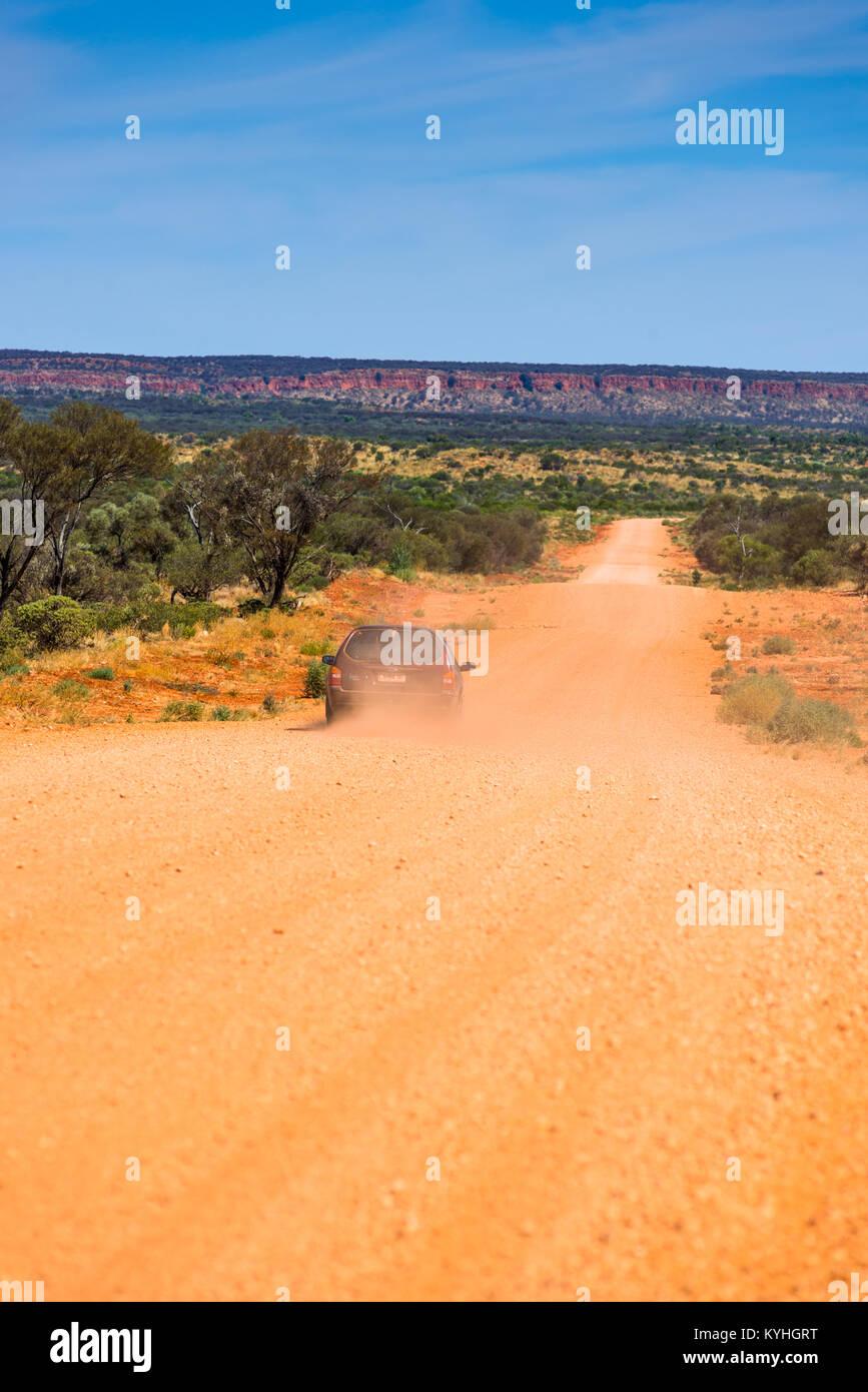 Unsealed dirt road in Central Australia. Stock Photo