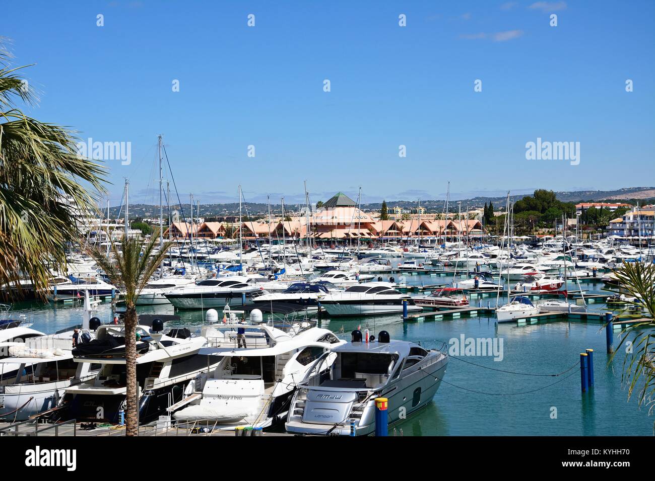 View of luxury yachts in the marina with buildings to the rear, Vilamoura, Algarve, Portugal, Europe. Stock Photo