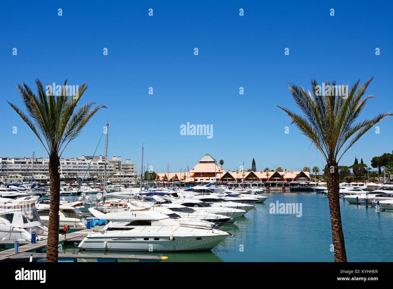 View of yachts in the marina with buildings to the rear, Vilamoura, Algarve, Portugal, Europe. Stock Photo