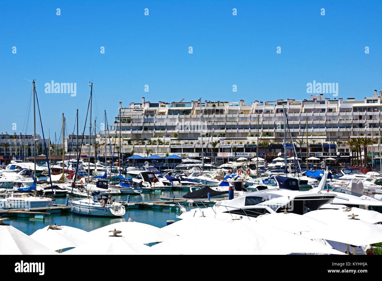 View of yachts in the marina with waterfront shops and restaurants to the rear, Vilamoura, Algarve, Portugal, Europe. Stock Photo