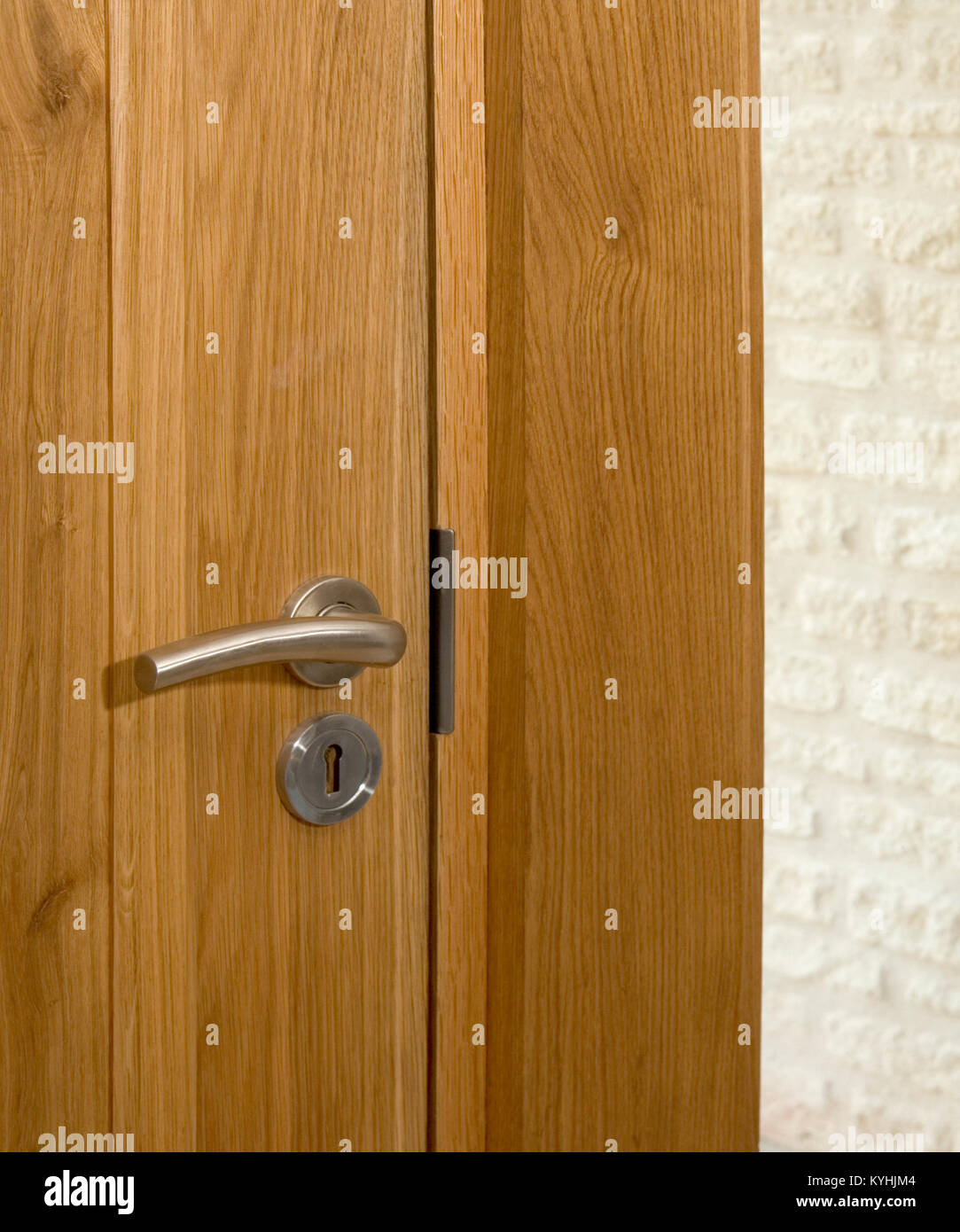 Contemporary Door Handle On A Closed Solid Wood Interior Door
