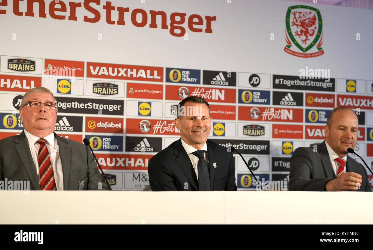 New Wales manager Ryan Giggs (centre), FAW President David Griffiths (left) and FAW Chief Executive Jonathan Ford during a press conference at Hensol Caste, Vale Resort, Hensol. Stock Photo
