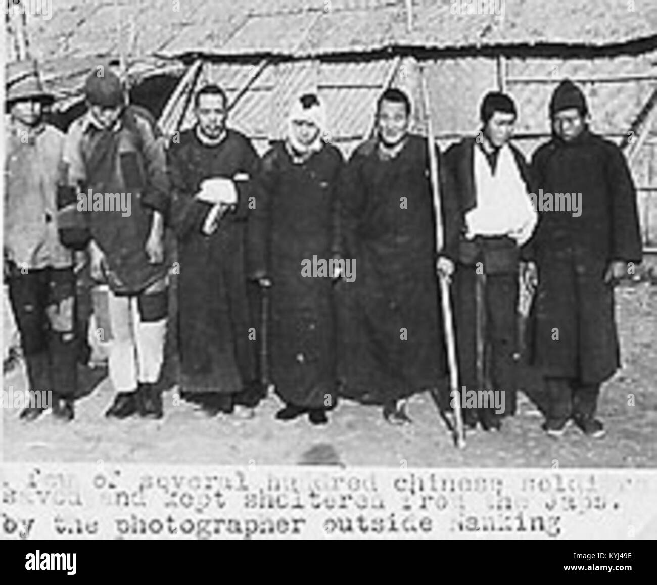 Some Chinese saved by Sindberg outside Nanjing, Nanjing Massacre Stock Photo