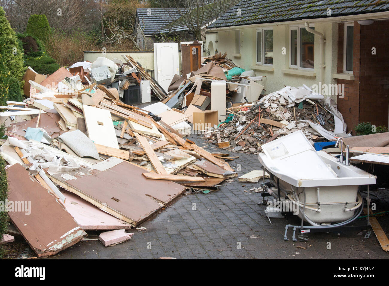 Flooded homes in Pooley Bridge, Cumbria, start the clean up operation. UK Stock Photo