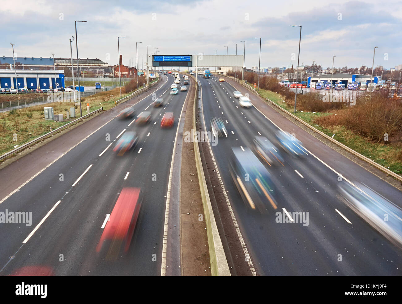 M74 motorway in Glasgow, Scotland, during a weekend traffic with car motion blur. Stock Photo