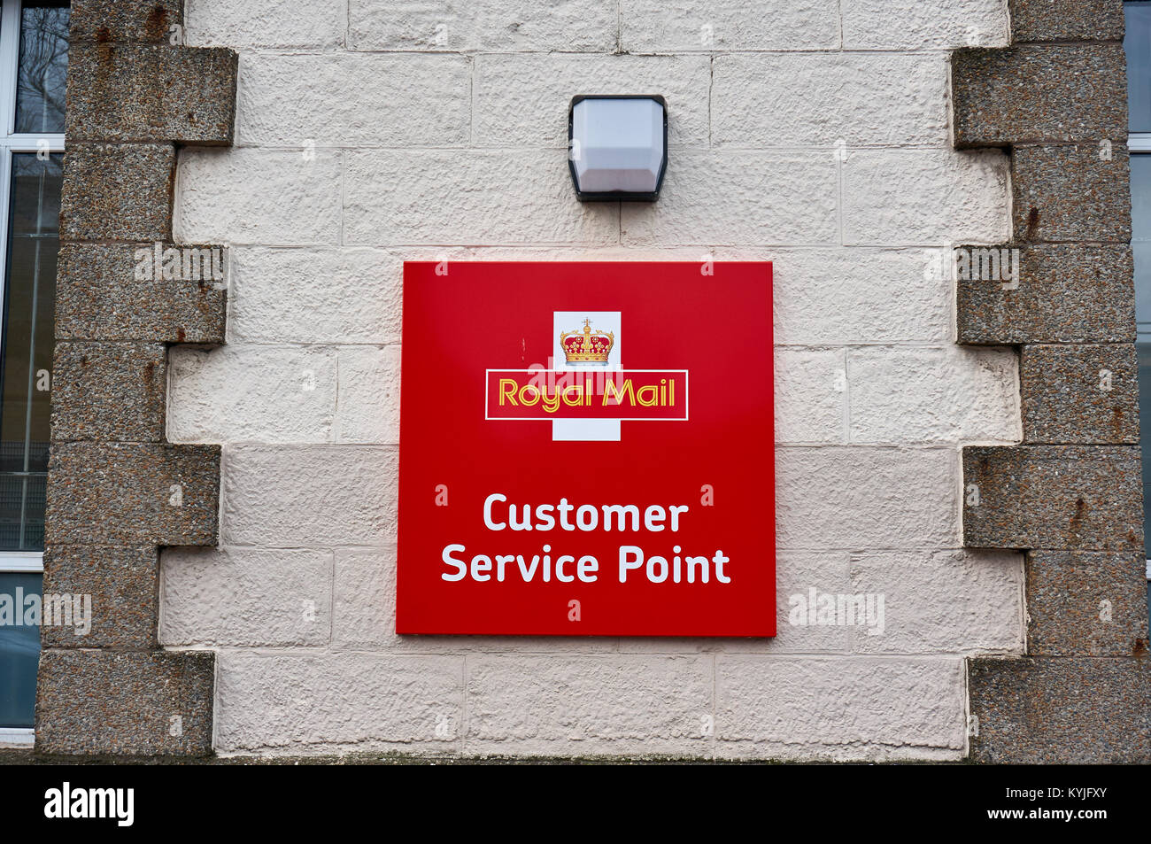Royal Mail plaque on the wall of a local post office indicating